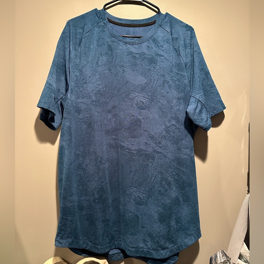 - Lululemon men’s XL shirt